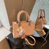 Nova Bolsa Quadrada Pequena Estilo Coreano Exquisita para Mulheres, Bolsa de Ombro Simples e Fashion, Bolsa Transversal Versátil para o Dia a Dia, Primavera de 2026
