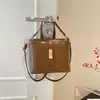 Bolso de hombro estilo retro para mujer, la última colección de moda otoño/invierno, bolso cruzado versátil, bolso tipo cubo tote a la moda
