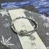 Pulseira da Moda Doce e Fresca Mais Vendida, Nova Pulseira em Formato de Coração Torcido e Entrelaçado com Anel de Möbius Estilo Chinês de Nicho
