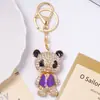 Chaleco de Pedrería que Gotea Aceite Oso Llavero Creativo Colgante de Llave para Mochila de Coche Oso Oso Cadena de Llave de Metal