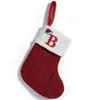 Medias navideñas de punto rojas decorativas y nuevas, con letras festivas bordadas y colgantes, para Navidad transfronterizas.