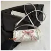 Nuevo Bolso de Mano Cilíndrico de Lunares Elegante para Mujer 2026 Modelo Nuevo Lindo de Alto Valor con Lazo Bolso Cruzado para Salidas