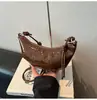 Bolso de Media Luna Texturizado Transfronterizo 2024 Otoño/Invierno Nuevo Bolso para Mujer, Bolso de Hombro con Diseño de Nicho, Bolso Cruzado Retro Simple, Moderno