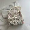 Nova bolsa de ombro e transversal geométrica floral bordada estilo chinês, bolsa tipo balde versátil da moda estilo étnico para mulheres