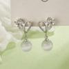 Pendientes colgantes encantadores con incrustaciones de diamantes de ópalo, pendientes para niñas, plato para incienso repelente de mosquitos, diseño de nicho, estilo occidental, estilo coreano, pendientes dulces únicos