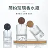 Botella de perfume redonda con forma de bola y diseño de montaña cilíndrica, botella con atomizador, botella vacía, en stock, empaque de fragancia, decantador de perfume, portátil