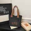 Bolsa de Lona de Gran Capacidad para Mujer, Nueva Tendencia Primavera 2026 Bolso Versátil para la Clase y el Trayecto Bolsa Tote