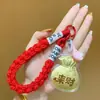 Los Regalos Promocionales Incluyen Bolsas de la Suerte, Colgantes para Teléfono, Pequeños Accesorios, Llaveros, Cadenas Lindas de Caricaturas para Teléfono y Bolsas
