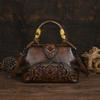 Otoño e Invierno Marrón retro Maillard con estampado de tótem cepillado Bolso de mano Tote en relieve estilo antiguo europeo y americano Bolso cruzado estilo étnico