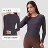 Nuevo top deportivo de manga larga para yoga de otoño para mujer, con tacto nude, corte ajustado y diseño de cuello redondo para fitness y ejercicio