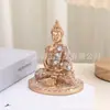 Estatua de resina transfronteriza del Buda de todo el salón, incluyendo al Buda Shakyamuni, el Bodhisattva Avalokiteshvara, el Bodhisattva Ksitigarbha y el Buda de los Tres Tesoros