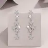 Pendientes de estrella de plata de ley S925 totalmente incrustados con moissanita, pendientes largos de tres meteoros, pendientes largos de moissanita