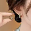 Pendientes de Aro Retorcido con Circonita Dorada para Mujer 2026 Nuevo Estilo Popular Pendientes de Aro de Gama Alta Pendientes Exquisitos para el Uso Diario