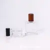 Difusor de Aroma Simple Botella Stock de Fábrica Botella de Vidrio Blanco Cristalino Fondo Grueso Cuadrado Plano Estilo Alto Botella Difusora de Aroma 50ml 100ml