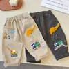 Ropa infantil estilo japonés~Nueva colección de otoño pantalones largos de dibujos animados de excavadora para niños, pantalones tejidos lindos para niños, pantalones casuales para bebés niños