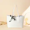 Bolso tote mujer 2024 moda bolso de mano simple bufanda decorativa bolso de hombro bolso de axila una generación de pelo