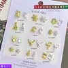 Adornos navideños de aleación más vendidos transfronterizos, con coronas florales 3D, copos de nieve y cabezas de renos en dorado y plateado, una colección de arte para uñas temática navideña con pedrería