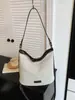 Bolsa de palha casual e descontraída estilo coreano, tecido fly-knit, grande capacidade, novo modelo 2026, adequada para férias na praia e para o dia a dia
