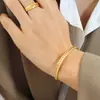 Europa y Estados Unidos no se desvanecen diseño abierto pulsera de trigo anillo de personalidad acero de titanio chapado en oro juego de joyas Z192-A150
