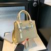 Bolso de moda de diseño de nicho para mujer, otoño 2024, nuevo bolso cuadrado pequeño portátil, bolso cruzado de un solo hombro de moda para mujer
