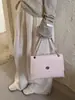 Bolsa de Axila Retrô Estilo Coreano para Mulheres 2026 Nova Outono e Inverno Luxo Leve Nicho Alta Qualidade Bolsa de Ombro Transversal para Mulheres