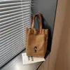 2026 nuevo bolso de lona de color liso, estilo coreano, nicho de moda, moderno, casual, simple, de alta calidad y elegante, bolso tote