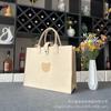 Bolsa de mano de fieltro al por mayor de fábrica, bolsa de regalo de mano sencilla de moda con logotipo, bolsa de mano de fieltro para viajeros