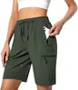 Shorts esportivos leves de secagem rápida para mulheres europeias e americanas, para camping, viagens, golfe, com bolsos com zíper e design casual à prova d'água