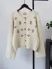 Cárdigan de punto floral a crochet de alta resistencia, un estilo dulce y femenino, nueva colección otoño/invierno 2026, abrigo suéter holgado estilo coreano para mujer