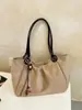 Bolso de mano retro de lunares estilo coreano, nueva colección principios de otoño 2026, moderno y único, bolso de hombro de gran capacidad