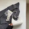 Bolsa de Braço para Mulheres 2026 Nova Tendência Moda Primavera Versátil Bolsa de Ombro de Luxo para o Dia a Dia Transversal Bolsa Meia-Lua