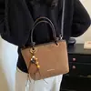 Bolso vintage de gamuza para mujer, nuevo bolso de hombro exquisito para el trabajo de otoño 2026, bolso cruzado tipo cubo Maillard