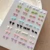 Acessórios mistos para nail art de laço cor de doce laço de fita oco broca de unha de resina decorações doces atacado