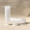 Botella dispensadora de tubo blando para viajes, Botella exprimible con tapa abatible boca abajo, Cosméticos, Champú, Gel de ducha, Botella vacía portátil