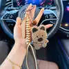 Estilo Coreano Otoño e Invierno Nuevo Llavero de Perrito de Felpa para Coche Cuerda Tejida Creativa West Highland Colgante Personalizado para Bolso Venta al por Mayor