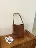 Bolso de hombro cruzado de patrón tejido de nicho para debajo del brazo, bolso de hombro casual vintage para el día a día, bolso tipo cubo versátil moderno y elegante
