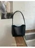 Bolsa de ombro tecida de luxo leve, bolsa de ombro simples e elegante, bolsa de mão casual e moderna estilo coreano ins para mulheres
