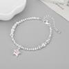 Pulsera Carlene de plata de ley 925 con carita sonriente amarilla y estrella de circonita en polvo.