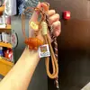 Miu Anillo de Llavero de Pan con Agua Alcalina Resina Pan Colgante de Llavero de Bolsa de Chocolate Regalo de Graduación