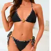 Nuevo bikini transfronterizo europeo y americano con copa triangular, estampado de leopardo, tirantes de atar, adornos de estrella de mar y un diseño sexy de dos piezas para mujer