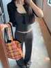 Calça de moletom feminina estilo americano cinza-pedra de cintura baixa, nova coleção outono 2026, modelagem solta, que afina a silhueta, estilo casual, calça pantalona com caimento fluido