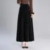 Moderna falda A-line de terciopelo dorado con estampado de leopardo para mujer, nuevo estilo otoño e invierno 2026, falda larga elegante y estilizada, falda acampanada de cintura alta