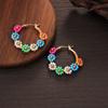 Pendientes de aleación con forma de flor y cuentas de colores de viento dulce a la moda para mujeres y niñas que viajan diariamente a fiestas navideñas.