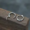 Nuevos pendientes de acero inoxidable de moda transfronterizos, hebilla de oreja redonda de cuerda retorcida creativa, pendientes de personalidad callejeros de moda para hombre, venta al por mayor
