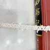 Venta directa en stock de fábrica encaje de lentejuelas encaje tejido centípedo cinturón de encaje accesorios de ropa infantil primavera y verano Xiaoqing