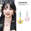 Los mismos pendientes florales de estilo que lleva Jiang Yan del restaurante chino, pendientes largos de borla estilo resort bohemio, pendientes de botón vintage de alta gama