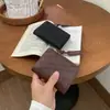 Cartera corta tejida de nuevo diseño de alta gama estilo coreano con patrón de diamantes para mujer, tarjetero con cremallera, llavero y clip para dinero - al por mayor