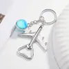 Abrebotellas de avión transfronterizo llavero colgante de llavero accesorio creativo para bolsa de coche en stock al por mayor acrílico