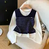 Conjunto de Dos Piezas para Mujer: Chaleco de Punto Rayado Otoño 2026 y Camiseta Blanca Estilo Coreano, Top Elegante y Sencillo 13499