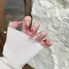 Falda de Encaje con Lunares Ojos de Gato Versátil Simple Lazo en Forma de Corazón Uñas Ojos de Gato Método de Dos Colores Negro y Rojo